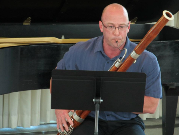 Dr. Jeffrey McCray playing the bassoon.
