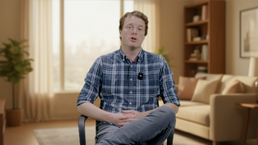 Dr. Sam Munroe sitting down and speaking in the Instructor Introduction video.